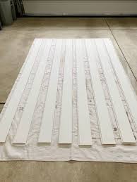 Ft., but once you factor in the cost of installation the big advantage shiplap has over drywall is how easy it is for a diyer to install with nothing more than. How To Install A Vertical Shiplap Wall Abby Lawson