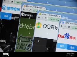 FILE--A Chinese netizen browses the websites of (from left) Chinese online  music sites Kugou.com, Kuwo.cn, QQ Music of Tencent, and Baidu music on h  Stock Photo - Alamy