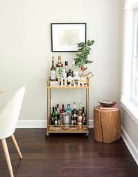 Keep everything organized with our dining room storage options, including buffets, sideboards, and credenzas—and top off good times with one of our gorgeous bar cabinets. Bar Cart In Dining Room Room For Tuesday