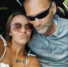 Who is a good barber for beard trimming and shaping in Evansville, IN?