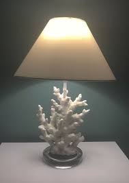 Interior designer kate jackson created a refreshing blue and white ocean theme bedroom, bringing wave table lamps to the night stands. Pin On Coastal Lamps Lighting