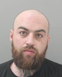 Two Red Deer men charged with conspiracy to commit murder, one at large