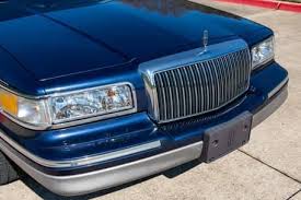 Image result for Portofino Blue 1995 Town Car