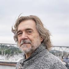 If you could magically acquire the talent to be the best at another sport,  what would it be? And top five songs for your training playlist?