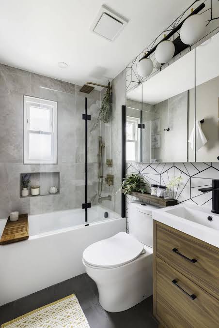 General contractor inspecting bathroom renovation work in San Jose