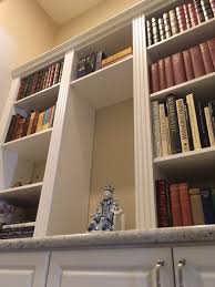 The vestibule in the background shows tiny space added by new nib walls as entry way to existing bathroom. Scottsdale Custom Cabinets Cabinet Makers Closet Storage Concepts