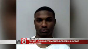 Police search for suspect in Manchester armed robbery