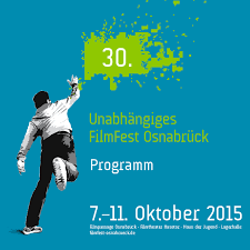 Prem leans back in his chair, a man at home in his surroundings. 2015 Unabhangiges Filmfest Osnabruck