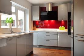 high gloss grey kitchen with red