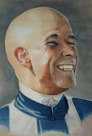 This painting of Frank Kennedy was sent to me by Sheamy Reid. He has  advised me that the artist who painted this had a disability and completed  this artwork by holding the