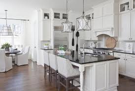Curbside pickup · everyday low prices · savings spotlights White Kitchen Island With Black Countertop And Gray Curved Arm Counter Stools Transitional Kitchen