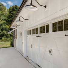 Our carriage houses typically have a garage on the main level with living quarters above. 75 Beautiful Three Car Garage Pictures Ideas April 2021 Houzz