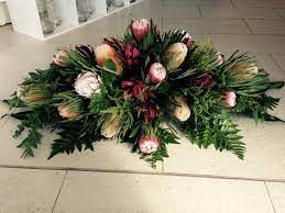 Such arrangements as casket sprays, floral rosaries, casket crosses, or lid arrangements are usually sent by the immediate family, and. Native Flower Funeral Casket Spray Casket Flowers Casket Sprays Dad Funeral Flowers