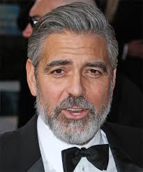 His hair's a little bit longer, somewhat more casual, not quite the cary grant look we're used to seeing the actor. George Clooney Hairstyles Hair Cuts And Colors