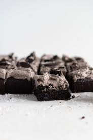 Dark Fudgy Black Cocoa Brownie Is Topped With An Oreo German Buttercream And Finished With Chunks Of Oreo And Fl Cocoa Brownies Cocoa Recipes Oreo Buttercream