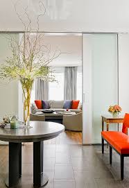 White modern living room with a white centerpiece face. Eye Catching Vase Arrangements That Tickle Your Fancy