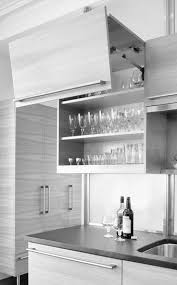 Cabinet doors that open upward. Kitchen Storage Solutions