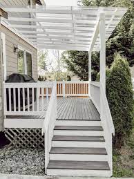 But maybe i should have painted the roof and privacy screen because the painters got primer over spray on our brand new black fence, one side of the house, our. Diy Clear Corrugated Covered Pergola Attached To The House And An Existing Deck Rain And Pine
