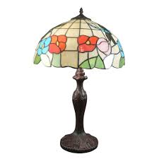 We also carry a number of new styled stained glass, tiffany style table lamps that are sure to illuminate your living space with a beautiful array of colors and warmth. Tiffany Dragonfly Style Lamp With White Background Stained Glass Light
