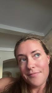 Girl Storming Field Bushes