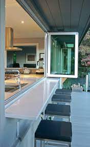 Decks entertaining kitchen outdoor kitchens outdoor spaces patios and decks. An Indoor Outdoor Serving Bar Opens The Possibilities