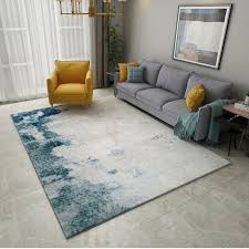 Choose one with the same width as your sofa, or go big with a rug that goes under the sofa to create a living room island. Abstract Ink Modern Carpet Home Snugs In 2021 Living Room Carpet Modern Carpet Living Room Decor Gray