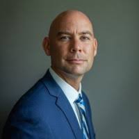 James A. Dotson, MBA