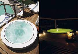 Its absolute geometrics give it a sculptured look its hollowed base makes it look like a shape suspended in space. Zucchetti Kos Minipool Deck Mount Ambient Showroom