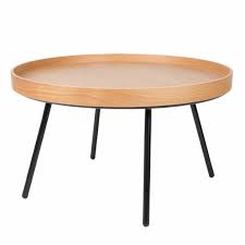 The tops of the legs don't quite touch the tabletop's beveled edge, creating a distinctive silhouette. Zuiver Oak Coffee Table Tray Wood O78x45cm Lefliving Com