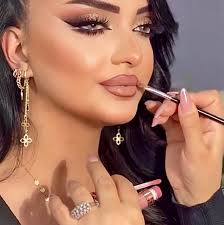 Who can recommend a hair stylist and makeup artist in Tysons, VA for a  wedding?