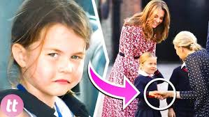 Princess Charlotte waves with cheeky Louis and George at Easter service