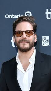 Daniel Brühl says the “humiliation” of working