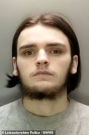 Moment hooded killer runs across road and stabs father, 50, in the neck  with a knife before fleeing scene