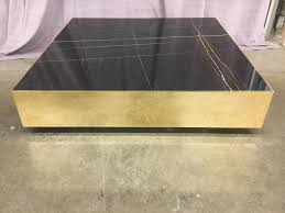 Measures 36 round to complement your living room without taking up too much space. Coffee Table Black Marble Gold Plated Steel Base Square High End Warehouse Black Gold Coffee Table Table 47 47 10 H Marble Gold Plated 2000 S Modern Universal Studios Property Department