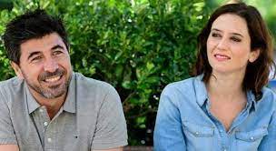The conservative leader of the regional district of madrid in spain has won a resounding victory after a bitter election. El Novio De Isabel Diaz Ayuso Se Protege De Los Haters De La Presidenta De La Comunidad De Madrid Informalia Es
