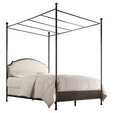 An upholstered, tufted headboard balances the sleek metal frame of this canopy queen bed to offer a look for your bedroom that is solidly rooted in classic style and enhanced with a significant touch of modern design. Kensington Metal Canopy Bed Queen Antique Bronze Inspire Q Target