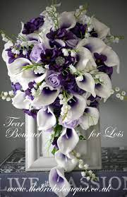 Purple Cascade Wedding Bouquet Featuring Purple Centred Picasso Calla Lily Purple Ros Purple Wedding Bouquets Purple Bridal Bouquet Cascading Wedding Bouquets