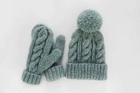 Here's a nice big bunch of hats to knit featuring plenty of styles to choose from and requiring a bulky tam: Classic Cabled Hat Mittens Free Pattern