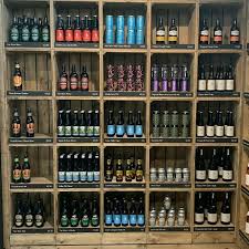 Pin By Pam Mcclung On Pearls In 2020 Wine Store Display Wine Shop Interior Craft Beer Shop