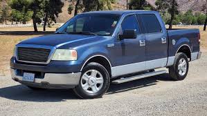 Image result for Light Ice Blue 2004 Ford