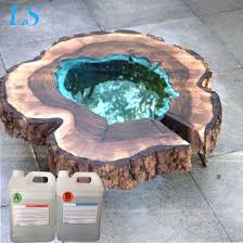 Books, toys, my laptop, our daughter's crayons. China Two Parts Liquid Ab Glue For Epoxy River Art Slab Single Coffee Table Dinner Table Epoxy Wood Coating China Epoxy Resin Clear Epoxy Resin