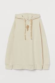 Billie eilish is obviously an inspiring artist, but also someone a lot of people around the world admire for her personal style and empowering way of expressing her values, said emily bjorkheim, h&m's head of design for divided. Oversized Sweatshirt Hoodie Light Beige Billie Eilish Ladies H M Us In 2021 Hoodie Fashion Clothes Billie Eilish Merch