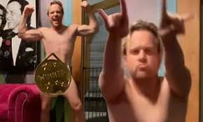 Hope you got what you came for. Olly Murs Leaves Almost Nothing To The Imagination As He Dances Naked In Front Of A Giant Coin Daily Mail Online