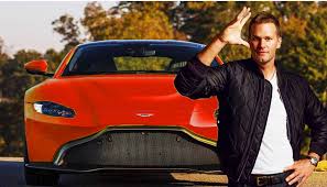An arrow pointing up and to the right. Tom Brady S New 2021 Super Bowl Car Collection Includes A Ferrari Rolls Royce Bugatti Tesla More Car Collectors Club