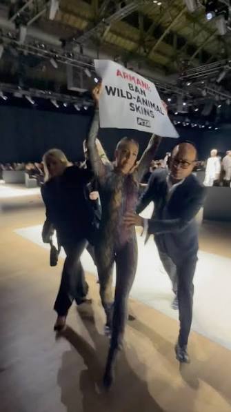  Fashion Week honcho manhandles protesters during runway ruckus