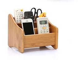 A great gift idea for the home entertainment system. Holzsammlung Remote Control Holder Bamboo Coffee Table Desktop Storage Box 3 Compartments Perfect For Makeup Tv Remote Ipad Cd Book And Other Small Items 1 Buy Online In Saint Vincent And The