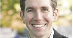 Tony Evers appoints clean energy advocate Tyler Huebner to Public Service  Commission