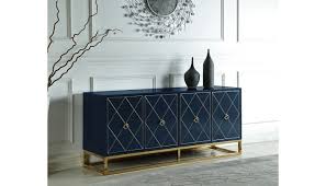 This credenza storage cabinet is constructed of selected mdf board and features a middle adjustable shelf & a bottom shelf for versatile storage. Fitz Navy Blue Buffet With Gold Accents