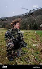 ANNECY, FRANCE - FEBRUARY 24: French soldier girl from the 27th Alpine  Fighter Regiment with a land force helicopter doing training during an  exercice Stock Photo - Alamy