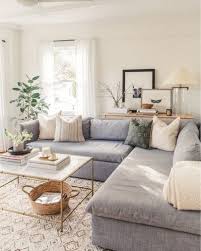 Modern Farmhouse Living Room With Gray Sectional Sofa And Farmhouse Pillows Boho Liv Modern Farmhouse Living Room Living Room Grey Farmhouse Decor Living Room